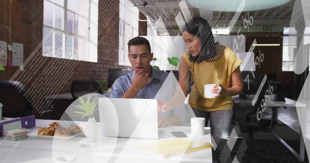 Colleagues Collaborating Over Laptop in Bright Open Office With Data Graphics Overlay