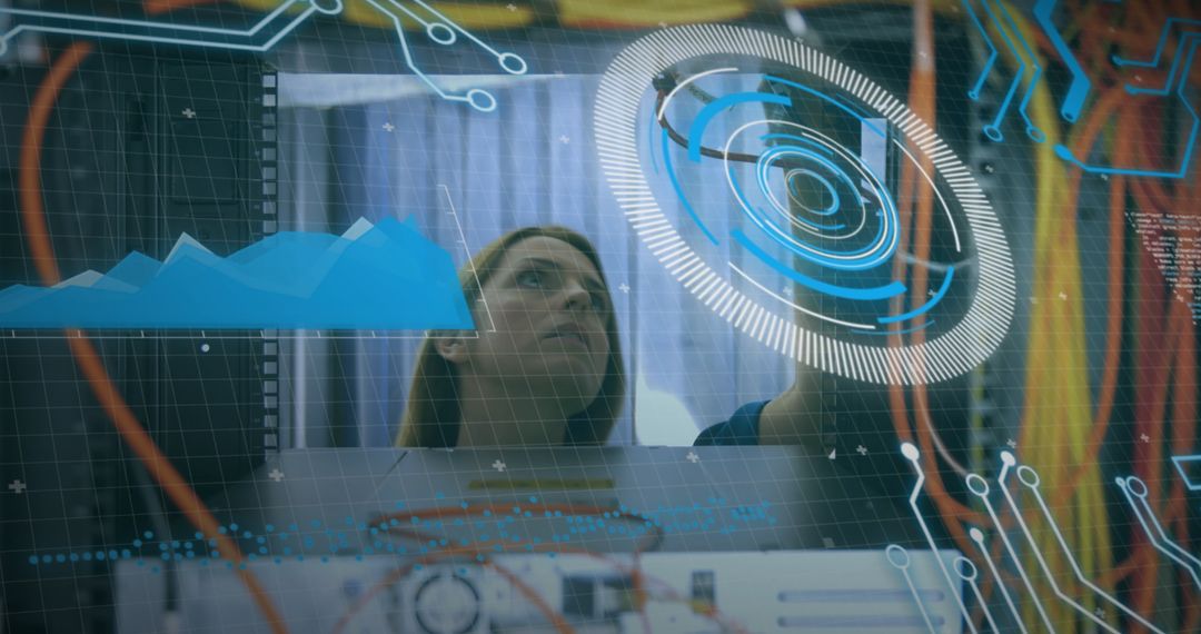 Female Engineer Connecting Wires with Augmented Reality Display