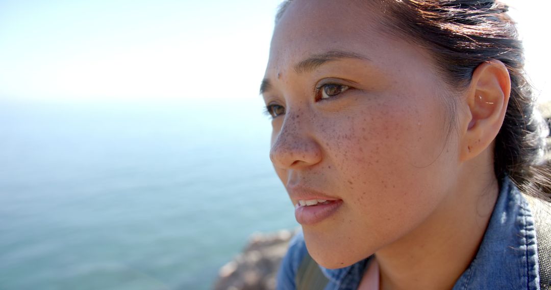 Woman Enjoying Scenic Mountain View on Hike