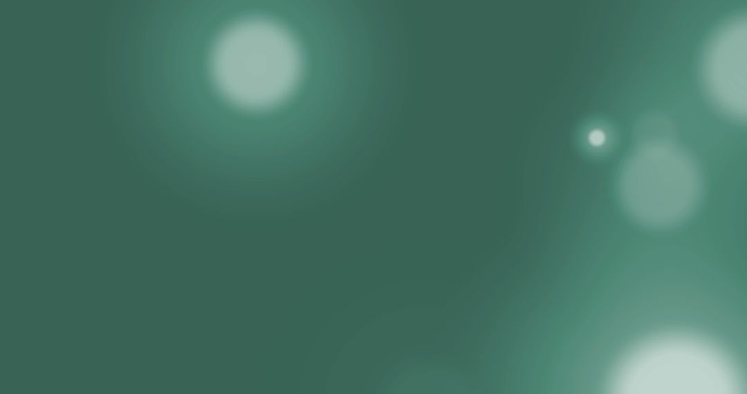 Glowing Light Spots on Dark Green Background
