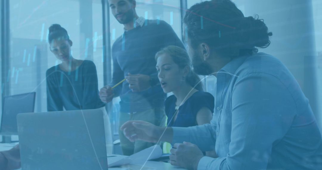 Diverse Team Collaborating with Financial Data Analysis Graphics