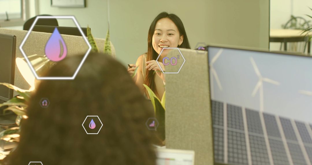 Colleagues Engaging in Sustainable Energy Discussion at Modern Office