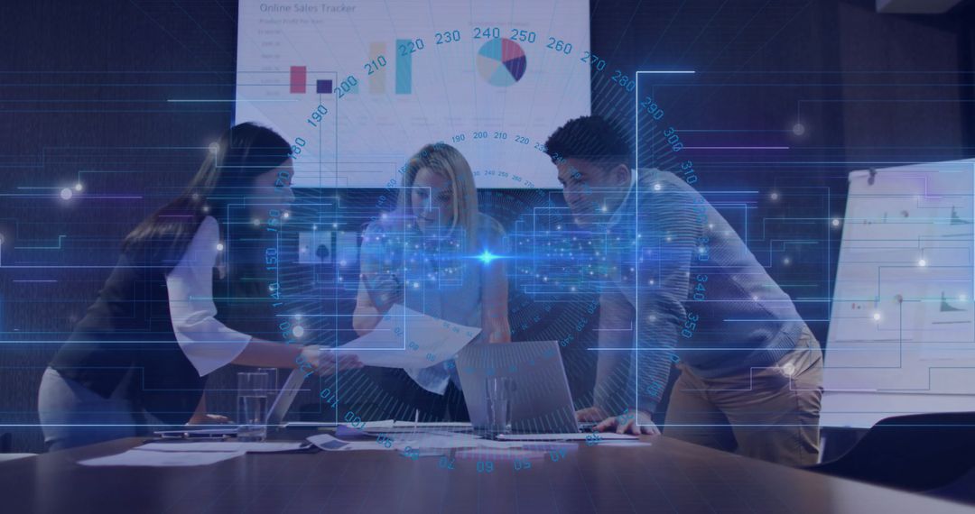 Business Professionals Analyzing Data Around Meeting Table