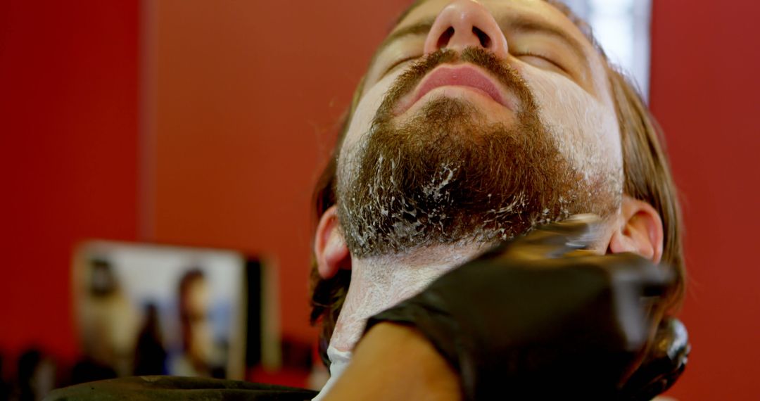 Professional Barber Applying Shaving Cream to Client's Beard - Free Images, Stock Photos and Pictures on Pikwizard.com