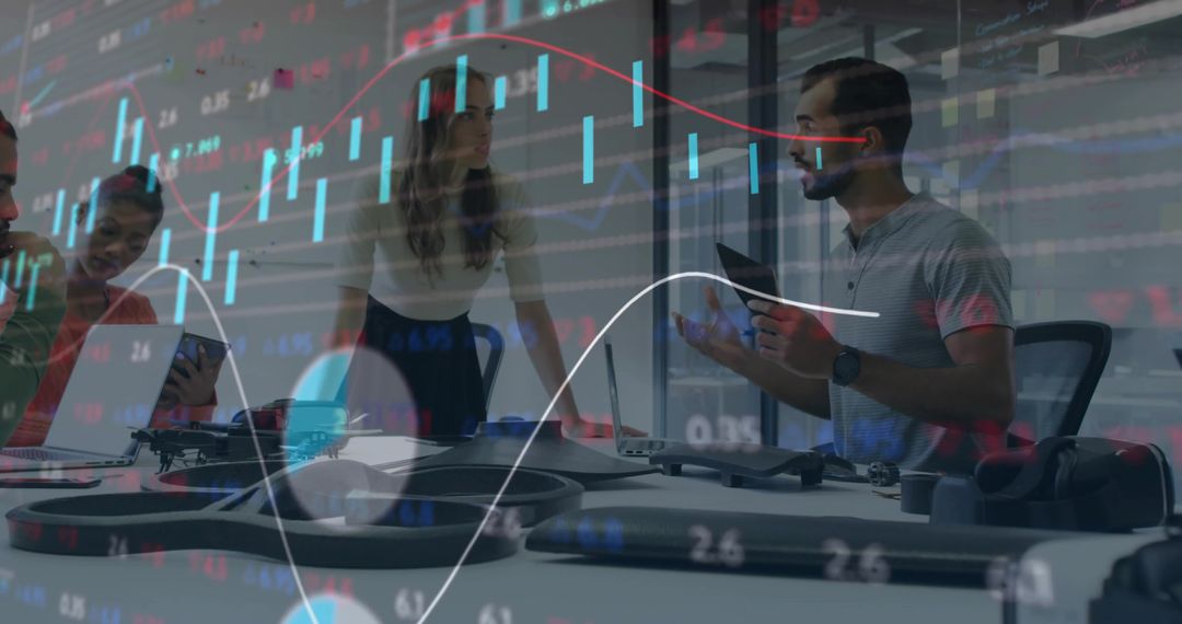 Team Discussing Financial Insights in Tech-Driven Office