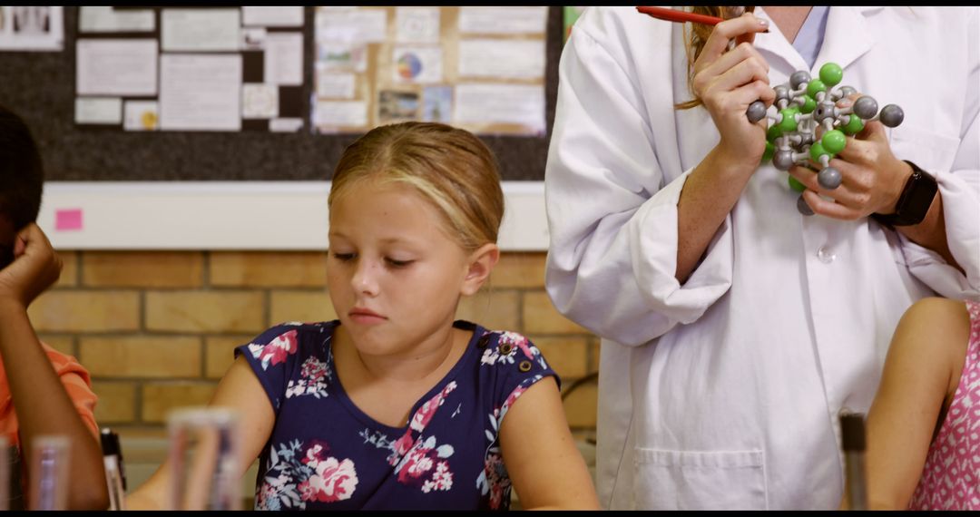 Young Students Learning Chemistry with Teacher in Classroom - Free Images, Stock Photos and Pictures on Pikwizard.com