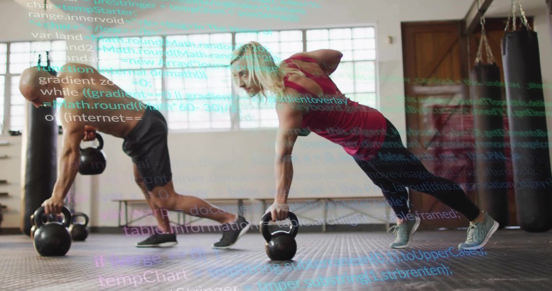 Training Partners Performing Kettlebell Renegade Rows in Gym