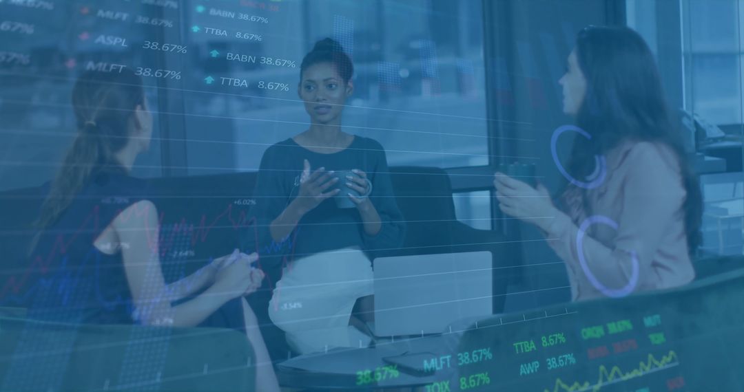 Diverse Businesswomen Discussing in Modern Office with Digital Data Overlay