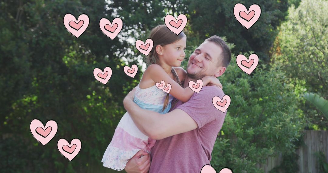 Father and Daughter Embracing with Animated Hearts Outdoors