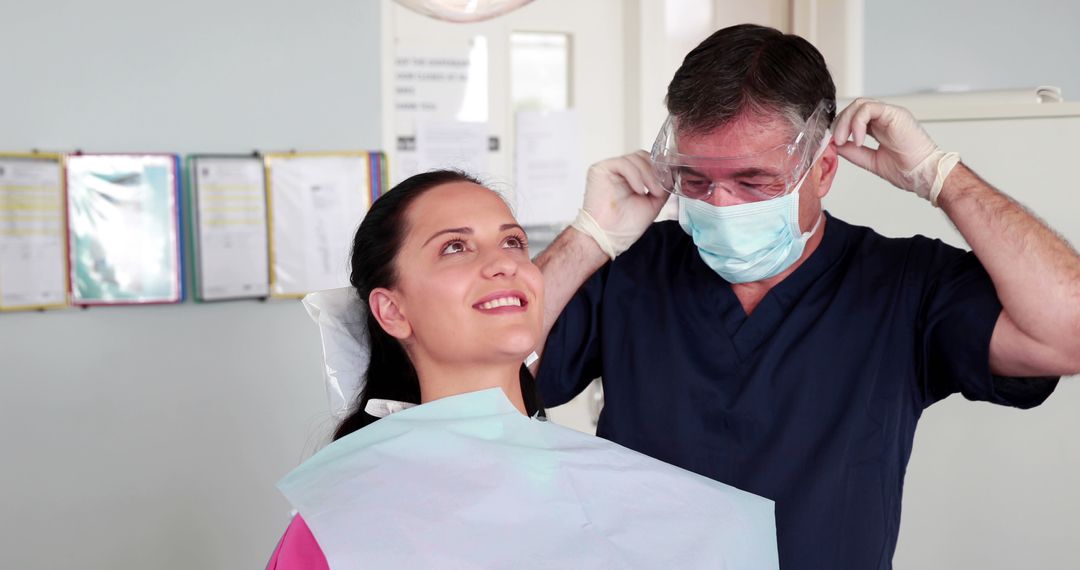 Dentist Prepares for Procedure with Patient - Free Images, Stock Photos and Pictures on Pikwizard.com