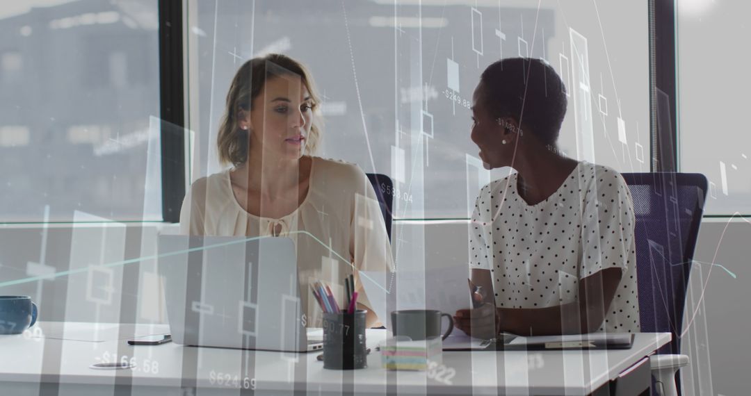 Multiracial Female Coworkers Analyzing Financial Reports with Growth Graphs - Free Images, Stock Photos and Pictures on Pikwizard.com