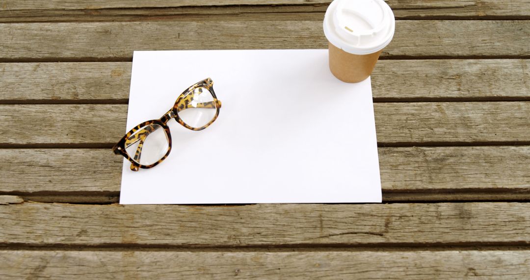 Empty Page on Wooden Table with Glasses and Coffee Cup - Free Images, Stock Photos and Pictures on Pikwizard.com