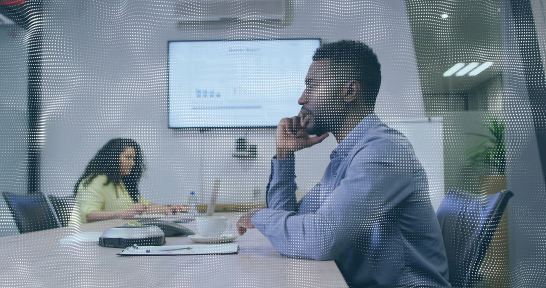 Business Colleagues Collaborating in Modern Meeting Room