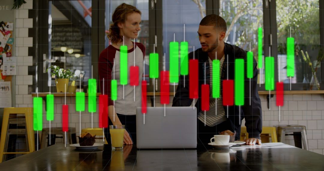 Two Colleagues Discussing Work with Financial Data Overlay in Modern Office - Free Images, Stock Photos and Pictures on Pikwizard.com