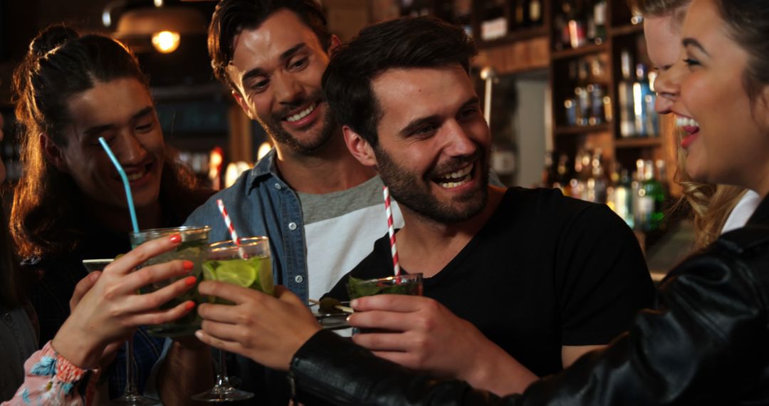 Young Adults Enjoying Lively Gathering at Cozy Bar
