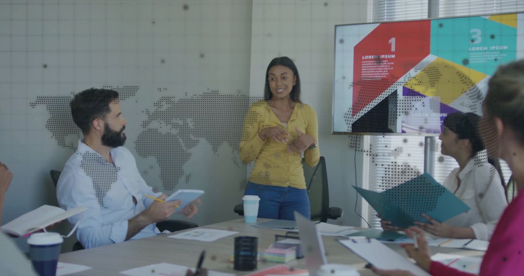 Female Leader Presenting Data in Modern Office Setting