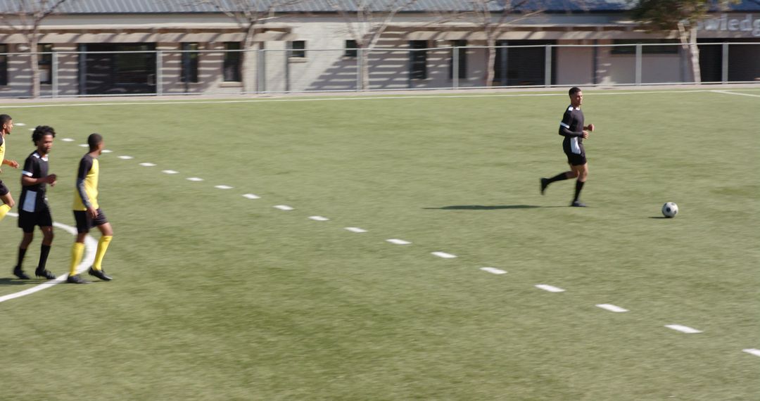 Soccer Players Practicing on AstroTurf Field
