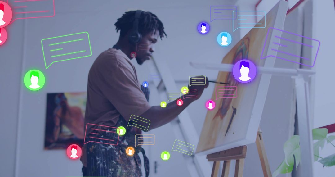 Artist Painting Canvas in Studio with Digital Interaction Elements