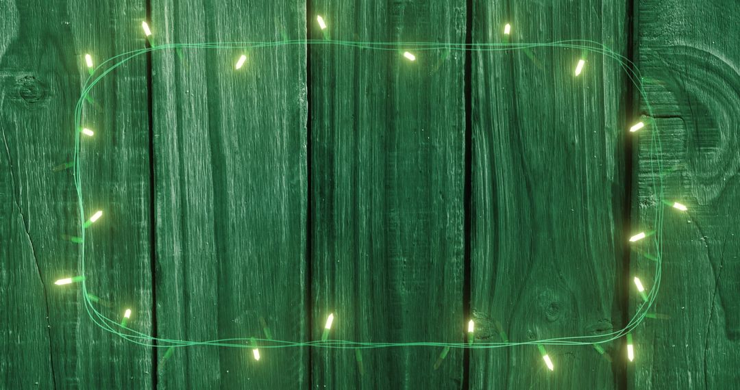 Fairy Lights on Green Wooden Background for Festive Celebrations - Free Images, Stock Photos and Pictures on Pikwizard.com