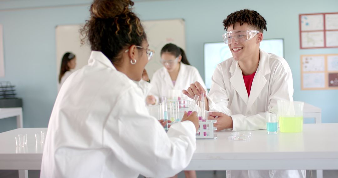 Engaged High School Students Conducting Science Experiment in Lab