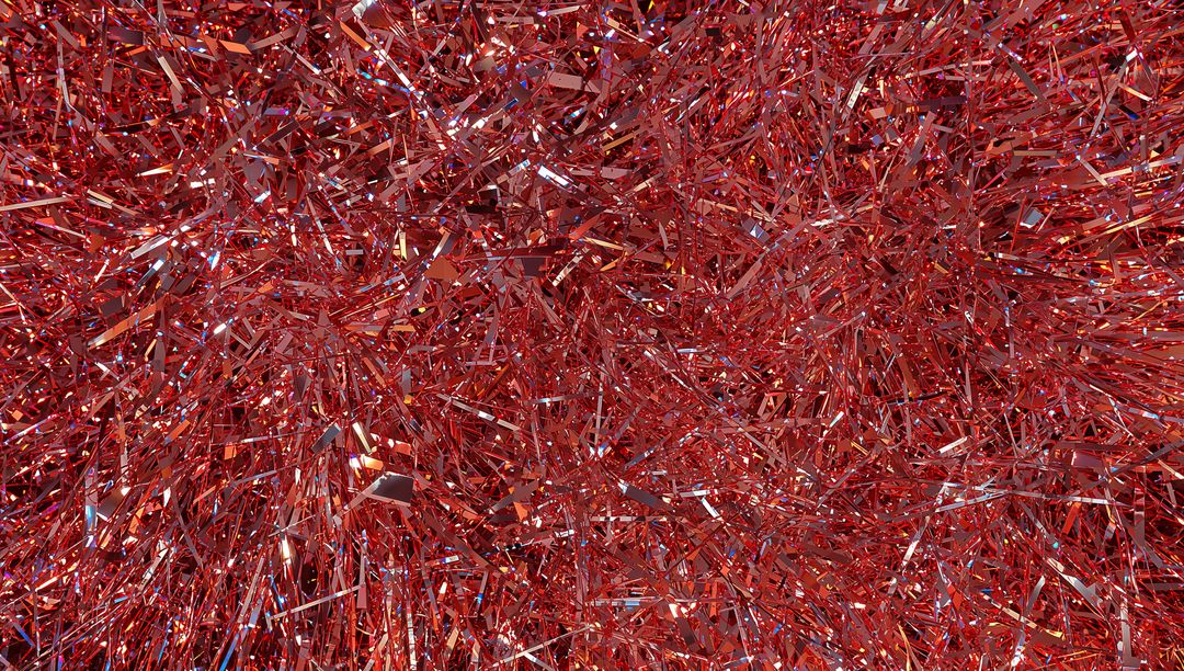 Glittering Red Tinsel Macro Texture Reflective Metallic Foil Sparkle Background Festive