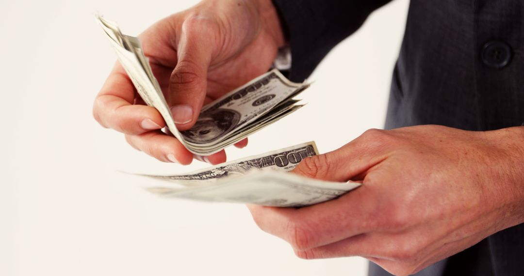 Businessperson Counting Cash Notes in Hands Close-Up - Free Images, Stock Photos and Pictures on Pikwizard.com