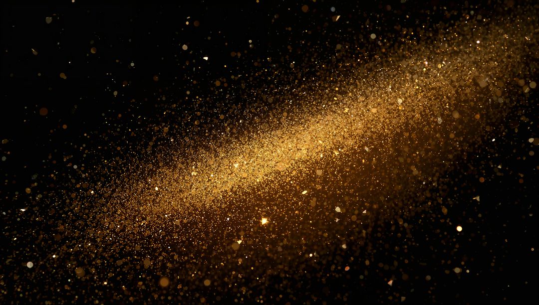 Shimmering Gold Dust Cloud Drifting Across Black Backdrop with Metallic Glitter Trail