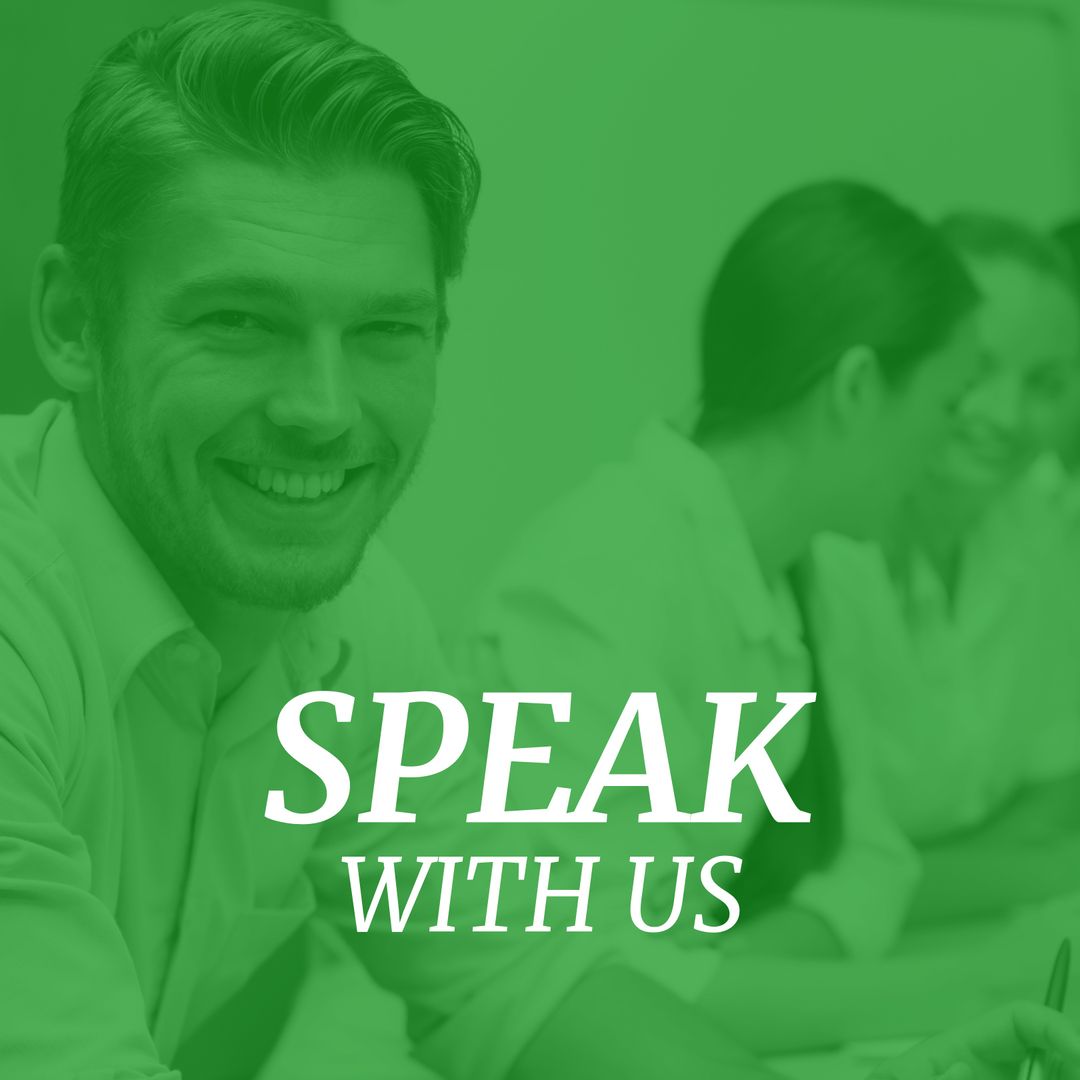 Smiling Male Counselor in Discussion Setting with Speak With Us Text Overlay