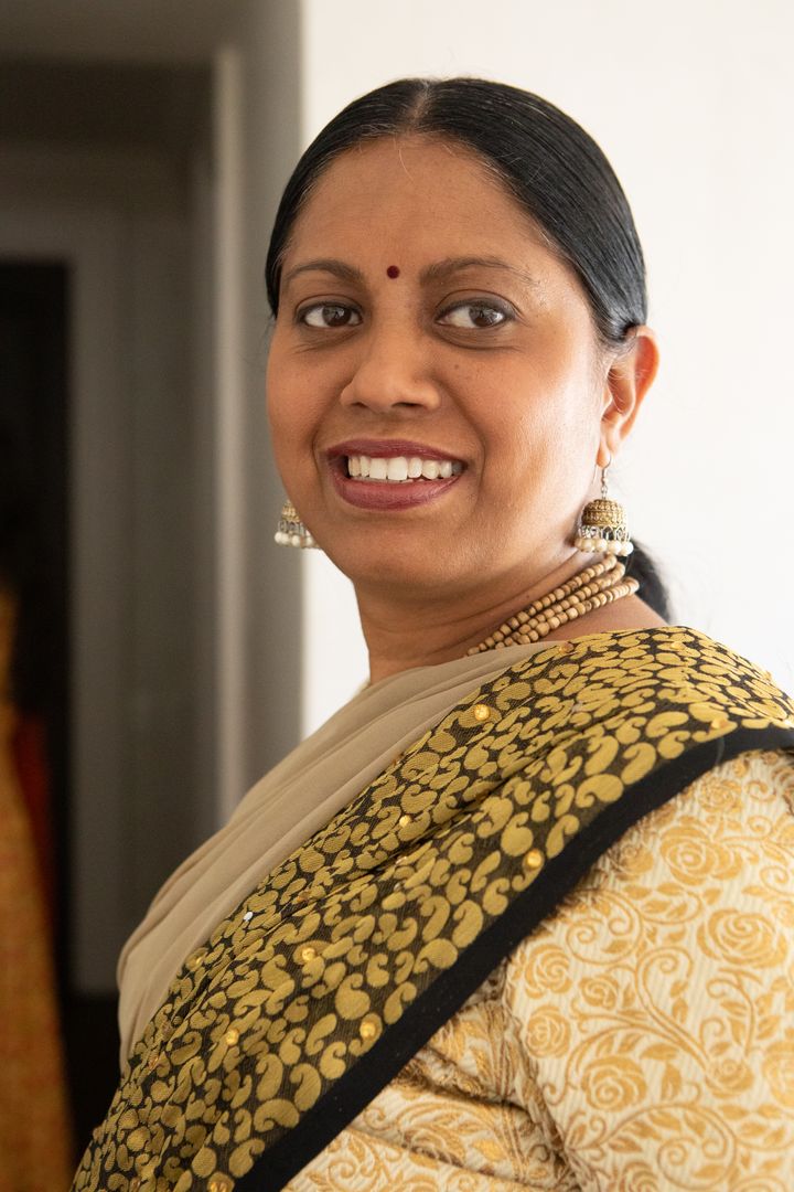 Elegant Indian Woman Wearing Traditional Saree and Accessories