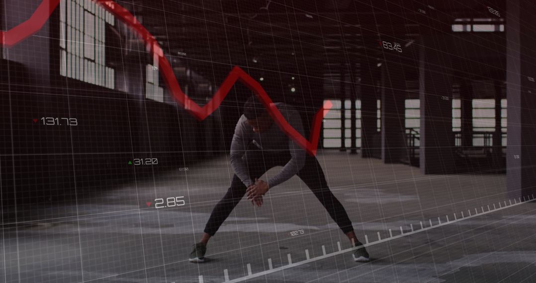 Athlete Stretching in Industrial Space with Digital Chart Overlay