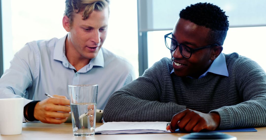 Multiracial Businessmen Collaborating in Modern Office