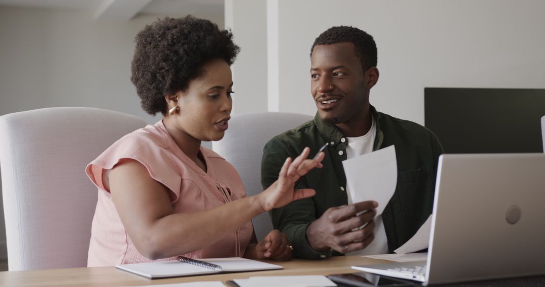 Collaborative Discussion on Project by Friends at Home Workspace