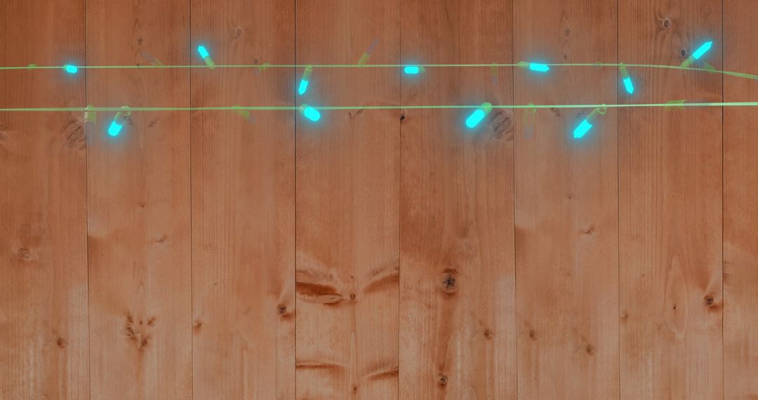 Flickering Fairy Lights Over Rustic Wooden Background - Free Images, Stock Photos and Pictures on Pikwizard.com