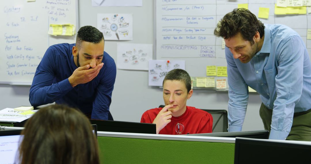 Collaborative Team Analyzing Project in Modern Office Space