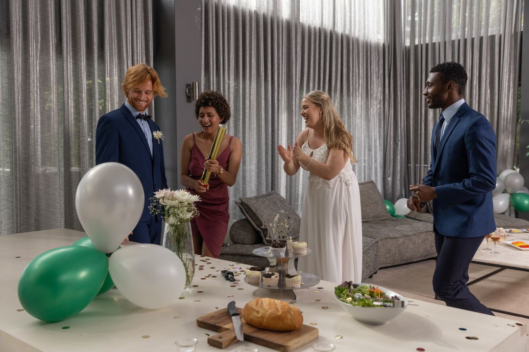 Diverse Group Celebrating with Balloons and Confetti