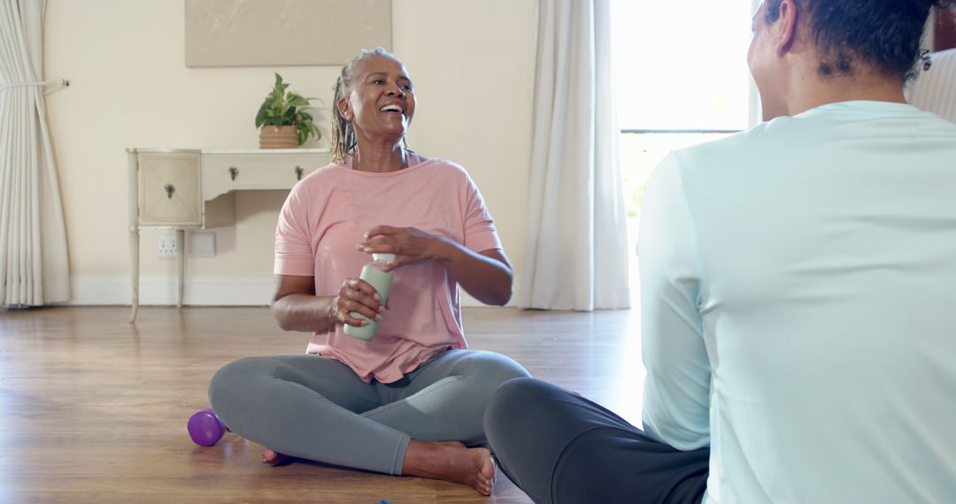 Diverse Friends Relaxing in Home Gym Focus on Wellness