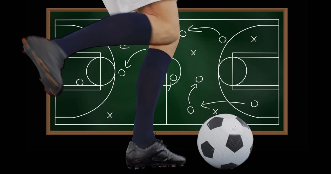Soccer Player Demonstrating Strategy with Kick in Front of Chalkboard