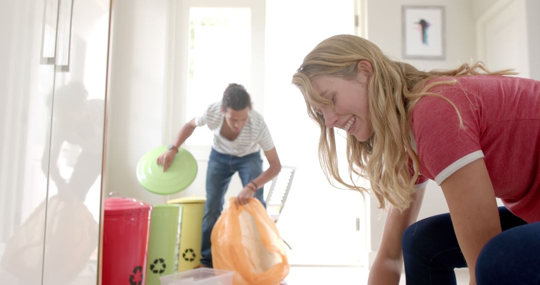 Couple Sorting Recycling at Home with Smiles - Free Images, Stock Photos and Pictures on Pikwizard.com