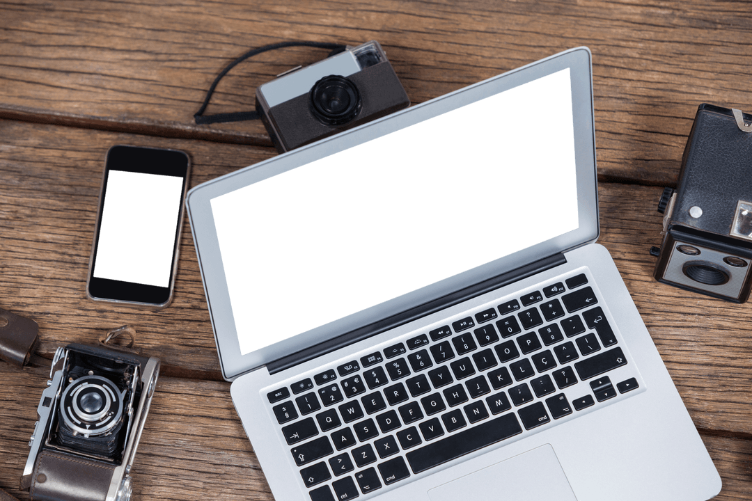Transparent Display on Laptop with Vintage Cameras on Wooden Background