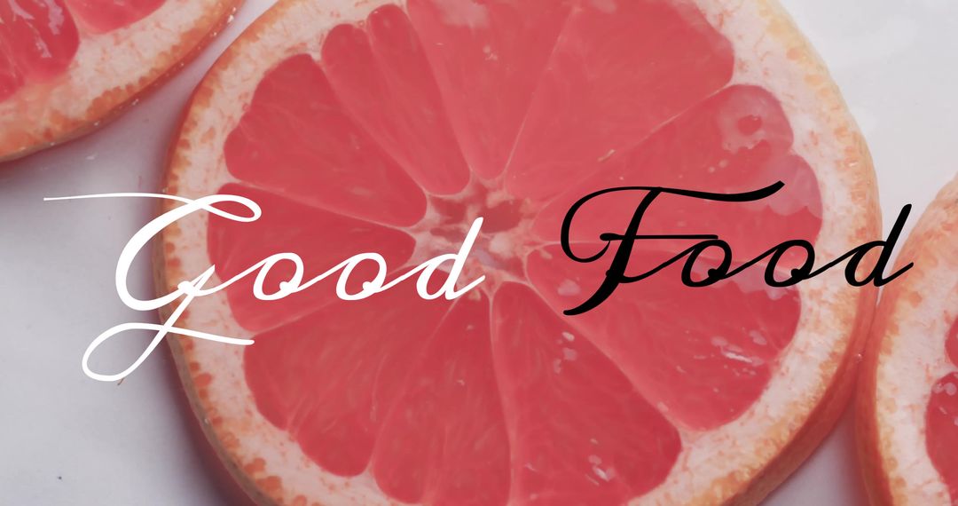 Sliced Grapefruit with Text Overlay 'Good Food'
