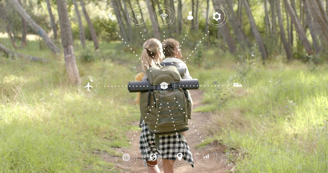 Hikers walking forest trail with AR backpack interface and outdoor tech icons