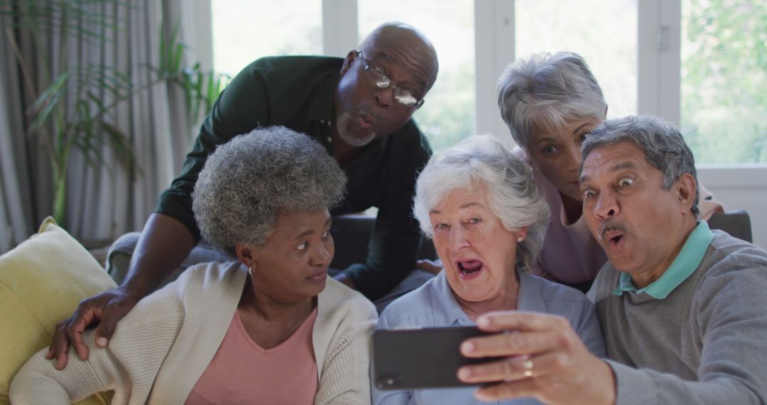 Group of Senior Friends Taking Selfie with Surprised Expressions - Free Images, Stock Photos and Pictures on Pikwizard.com