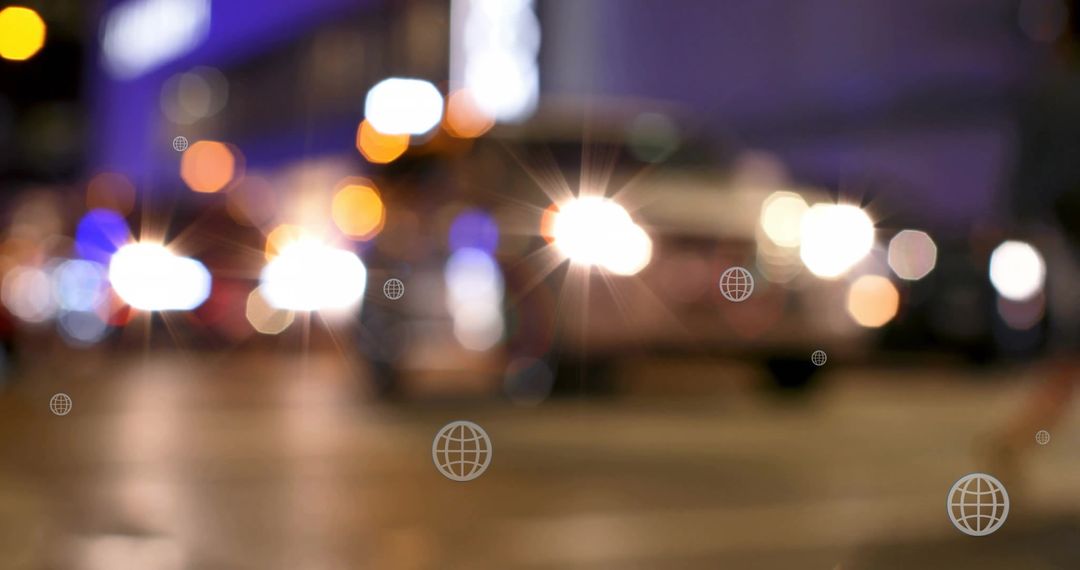 Blurred Traffic with Globe Icons in Urban Night Setting