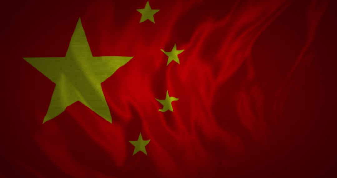 Waving Chinese Flag Symbolizing National Pride and Unity