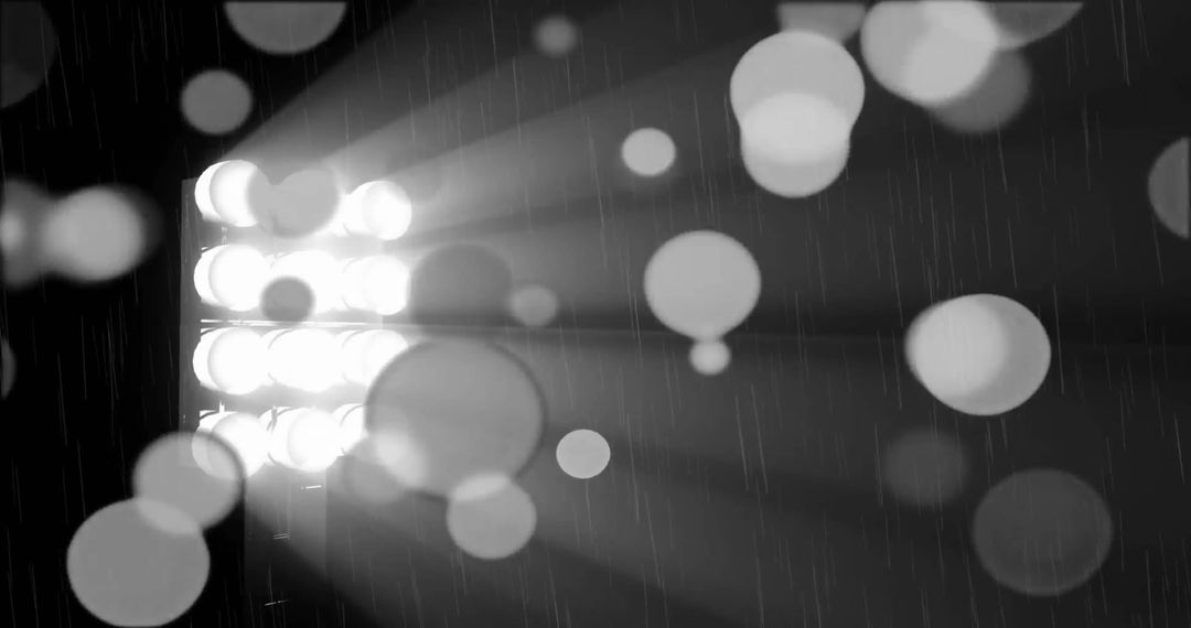 Abstract Glowing Light Spots on Black Background