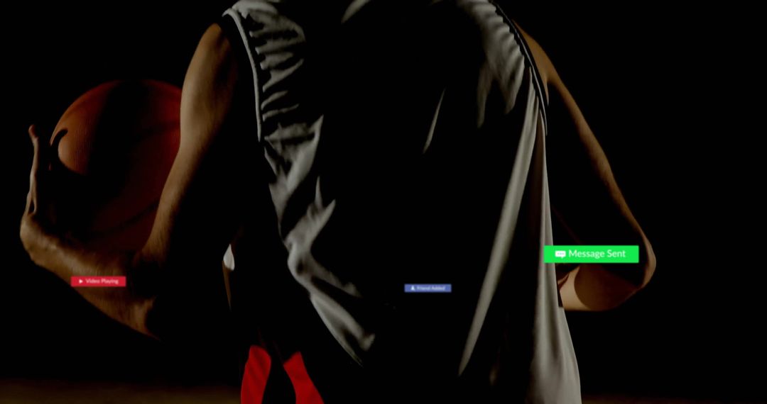 Athlete Holding Basketball with Notifications in Gym