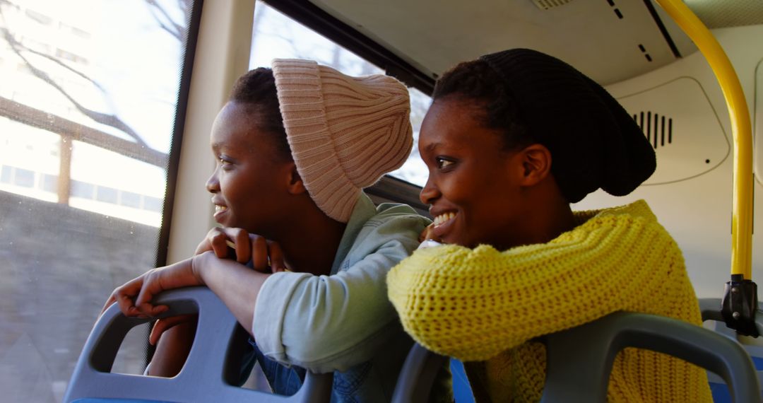 Twin Sisters Enjoying a Bus Ride Together
