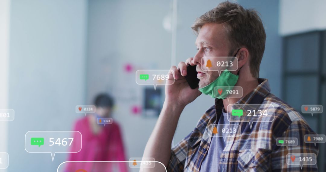 Man in Plaid Shirt Speaking on Smartphone with Alert Icons