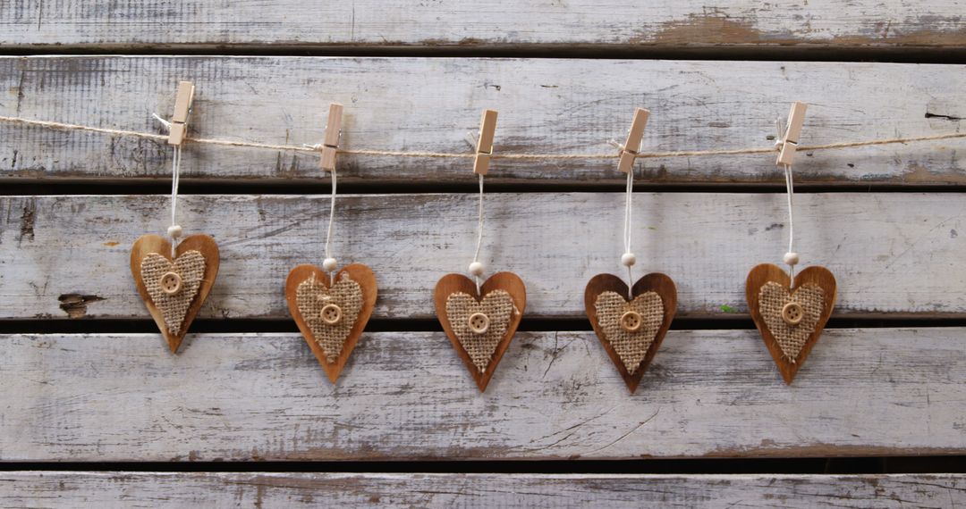 Heart-Shaped Rustic Ornaments on Wooden Background - Free Images, Stock Photos and Pictures on Pikwizard.com