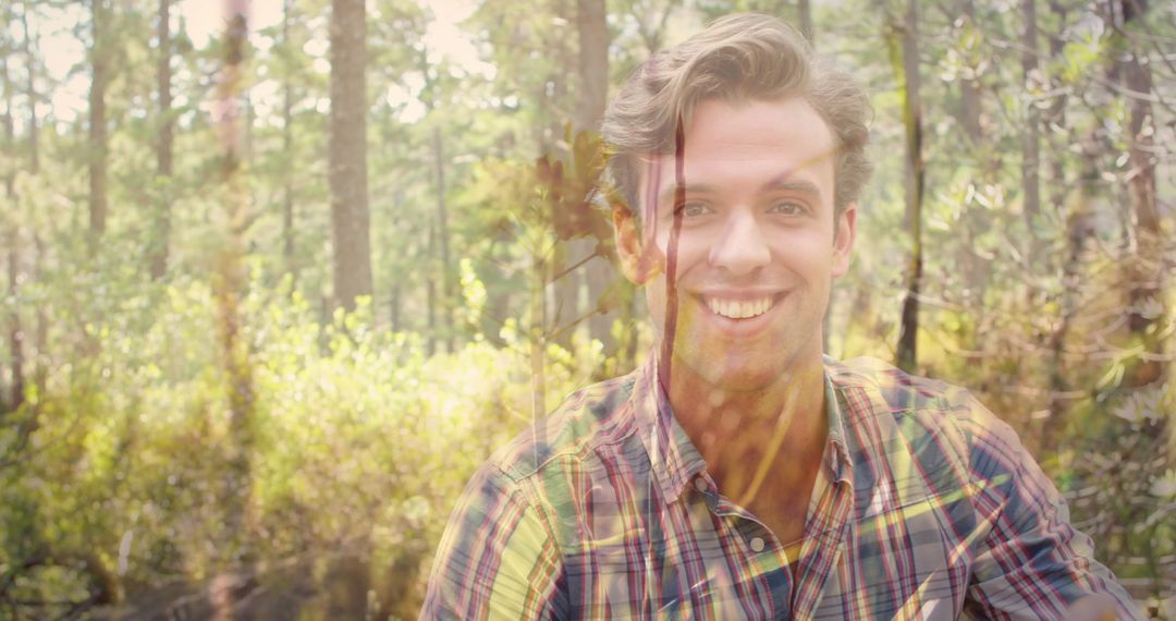 Happy Man Exploring Nature in Sunny wooded area